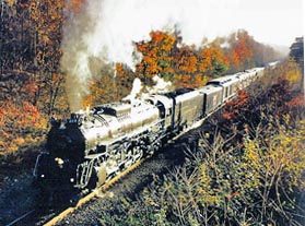 Family vacation train travel on private railcars can include steam locomotives